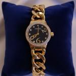 ساعه استيك كرتير ارقام كبيره فضي وذهبي