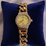 ساعه استيك كرتير ارقام كبيره فضي وذهبي