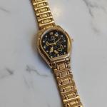 ساعه استيك معدن ذهبي وفضي فراشات