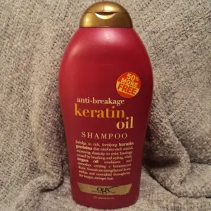 اوجي اكس شامبو كيرياتين 385م احمر