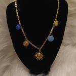 سلسلة نسائية بشكل شمس و صدف ازرق