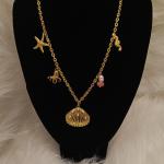 سلسلة نسائية شكل صدفة و حصان و لؤلؤ